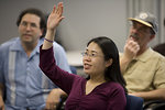 Free Stock Photo: Men and women at a town hall meeting