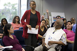 Free Stock Photo: Men and women at a town hall meeting