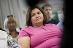 Free Stock Photo: Men and women at a town hall meeting