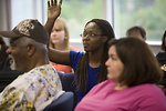 Free Stock Photo: Men and women at a town hall meeting