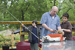 Free Stock Photo: A father and two sons going fishing