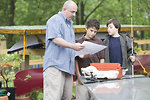 Free Stock Photo: A father and two sons going fishing