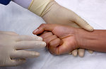 Free Stock Photo: A patient having blood drawn from a doctor
