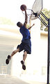 Free Stock Photo: A young man dunking a basketball