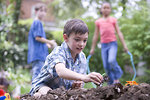 Free Stock Photo: A young boy and friends playing outside