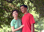 Free Stock Photo: An asian couple smiling at each other outdoors