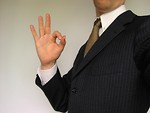 Free Stock Photo: Business man in suit making OK symbol