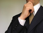 Free Stock Photo: Business man holding hand to chin