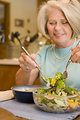 Free Stock Photo: A woman eating a fresh salad