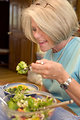 Free Stock Photo: A woman eating a fresh salad