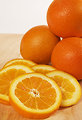 Free Stock Photo: Orange slices on a cutting board