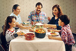 Free Stock Photo: A Hispanic family eating lunch at a kitchen table