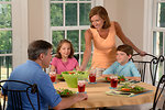 Free Stock Photo: A family eating lunch at the kitchen table