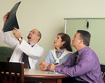 Free Stock Photo: A doctor and couple viewing an x-ray