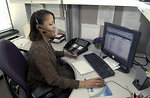 Free Stock Photo: An African American woman working at her desk