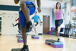 Free Stock Photo: Men and women performing aerobic exercises