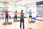 Free Stock Photo: Men and women performing aerobic exercises