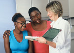 Free Stock Photo: A female doctor consults with a family