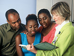 Free Stock Photo: A female doctor consults with a family