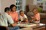 Free Stock Photo: A family playing a board game