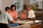 Free Stock Photo: A family playing a board game