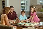 Free Stock Photo: A family playing a board game