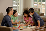 Free Stock Photo: A family playing a board game