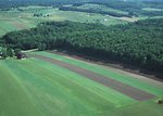 Free Stock Photo: An aerial shot of strip cropping and woodlots on a farm
