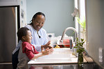 Free Stock Photo: A young boy learning how to wash his hands