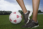 Free Stock Photo: Female legs and a soccer ball