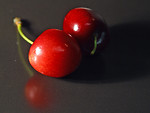 Free Stock Photo: Closeup of two red cherries