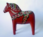 Free Stock Photo: A red painted wooden toy horse