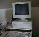 Free Stock Photo: A white computer and monitor on a desk