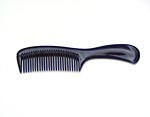 Free Stock Photo: Black comb on a white background