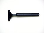 Free Stock Photo: Black razor on a white background