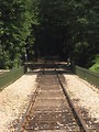 Free Stock Photo: Train tracks leading into the woods