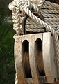 Free Stock Photo: Closeup of rope and a wooden pulley