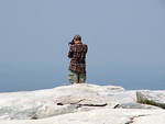 Free Stock Photo: Tourist taking a picture from the top of Stone Mountain