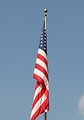 Free Stock Photo: US flag on a flag pole with no wind