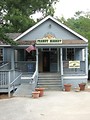 Free Stock Photo: Store front with flag at Stone Mountain Park