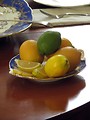 Free Stock Photo: Closeup of a plate of fruit on elegant table setting