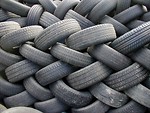 Free Stock Photo: A wall of piled car tires