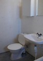 Free Stock Photo: Toilet and sink in a small bathroom