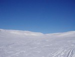 Free Stock Photo: Solid blue sky from top of snow covered mountain