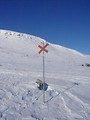 Free Stock Photo: Sign post in snow at top of mountain
