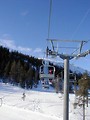 Free Stock Photo: A chair lift climbing a ski mountain