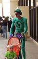 Free Stock Photo: Man in Riddler costume with boy in stroller at Dragoncon 2008