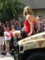 Free Stock Photo: Girl on the hood of a military truck in 2008 Dragoncon parade