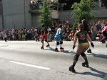 Free Stock Photo: Girls roller skating in the 2008 Dragoncon parade