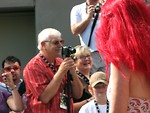 Free Stock Photo: Bystanders watch a girl at 2008 Dragoncon parade